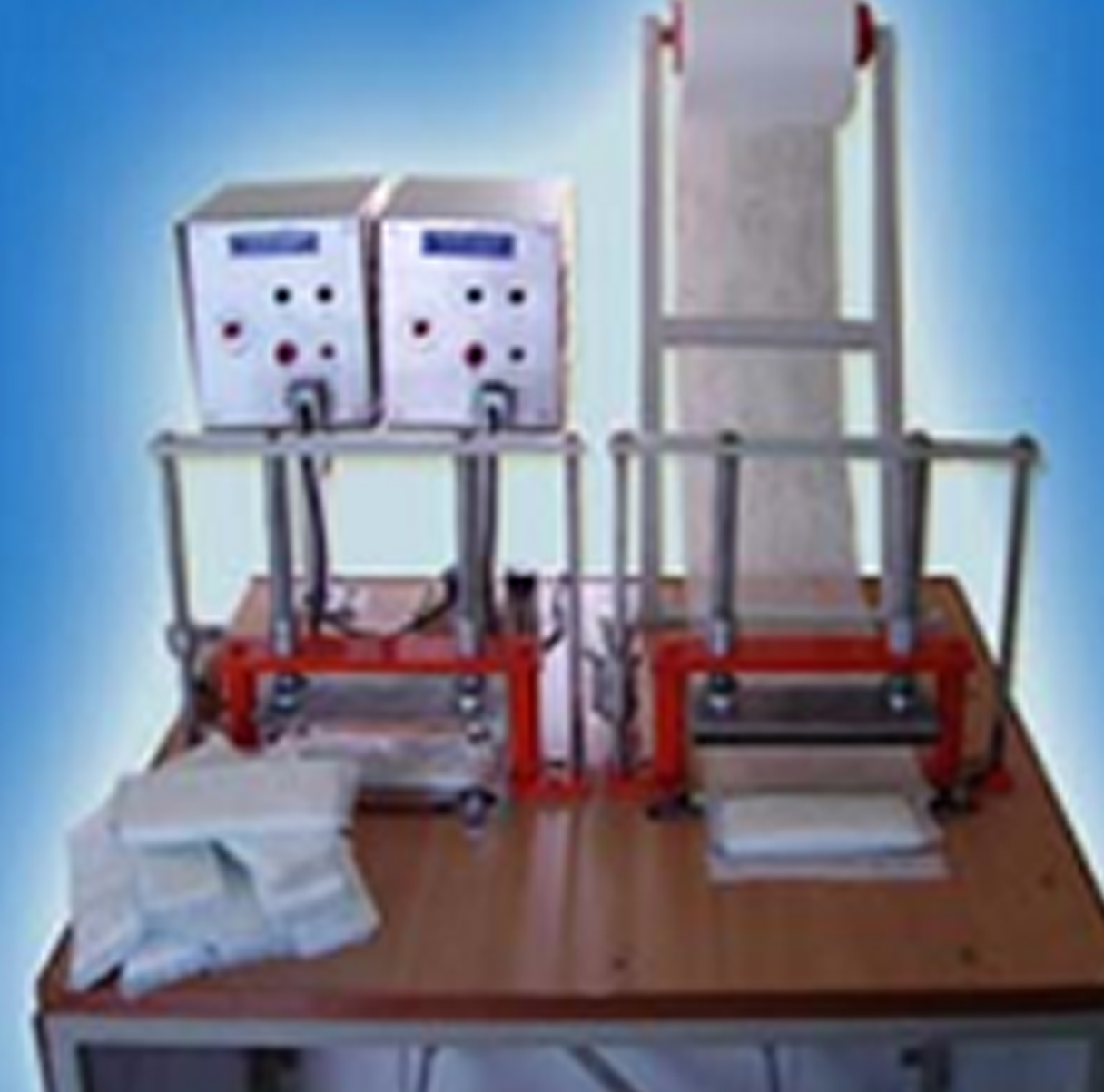 Mini sanitary napkin making machine - Photo