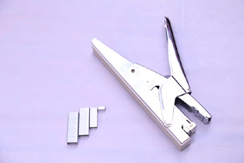 All in one stapler for all size of pins - Photo