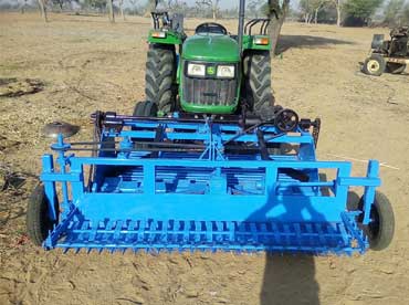 Image of Onion Harvester and Motorcycle Operated Salt Turning Device 