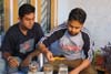 volunteer Nikhilesh Das and Debanjan Mukherjee